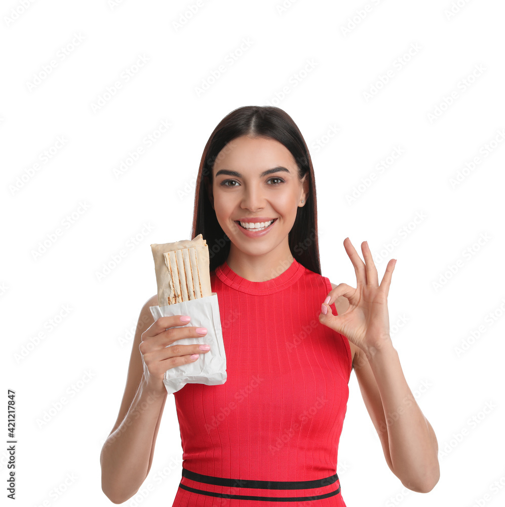 Happy young woman with delicious shawarma on white background Happy young woman with delicious shawarma on white background
