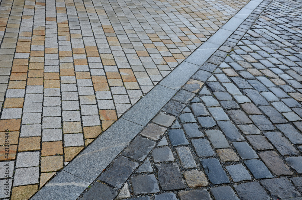 stone paving of squares and streets of various formats and sizes and ...