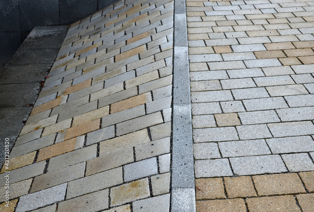 stone paving of squares and streets of various formats and sizes and ...