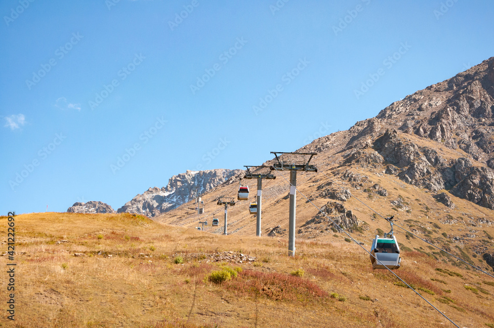 Cable car in beautiful Shymbulak mountains near Almaty, Kazakhstan