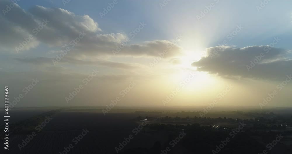 Aerial landscape view. Countryside panorama. Nature inspiration. Calming peace. Goal perspective. Sunset misty lights with agricultural fields and valley slow motion. Aerial landscape view. Countryside panorama. Nature inspiration. Calming peace. Goal perspective. Sunset misty lights with agricultural fields and valley slow motion.