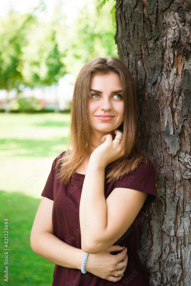 Attractive young woman enjoying her time outside in the park. Attractive young woman enjoying her time outside in the park.