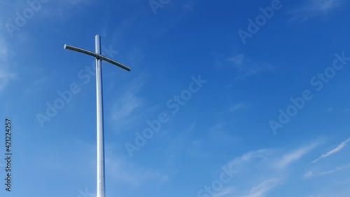 Catholic cross against the sky. © the_pixel