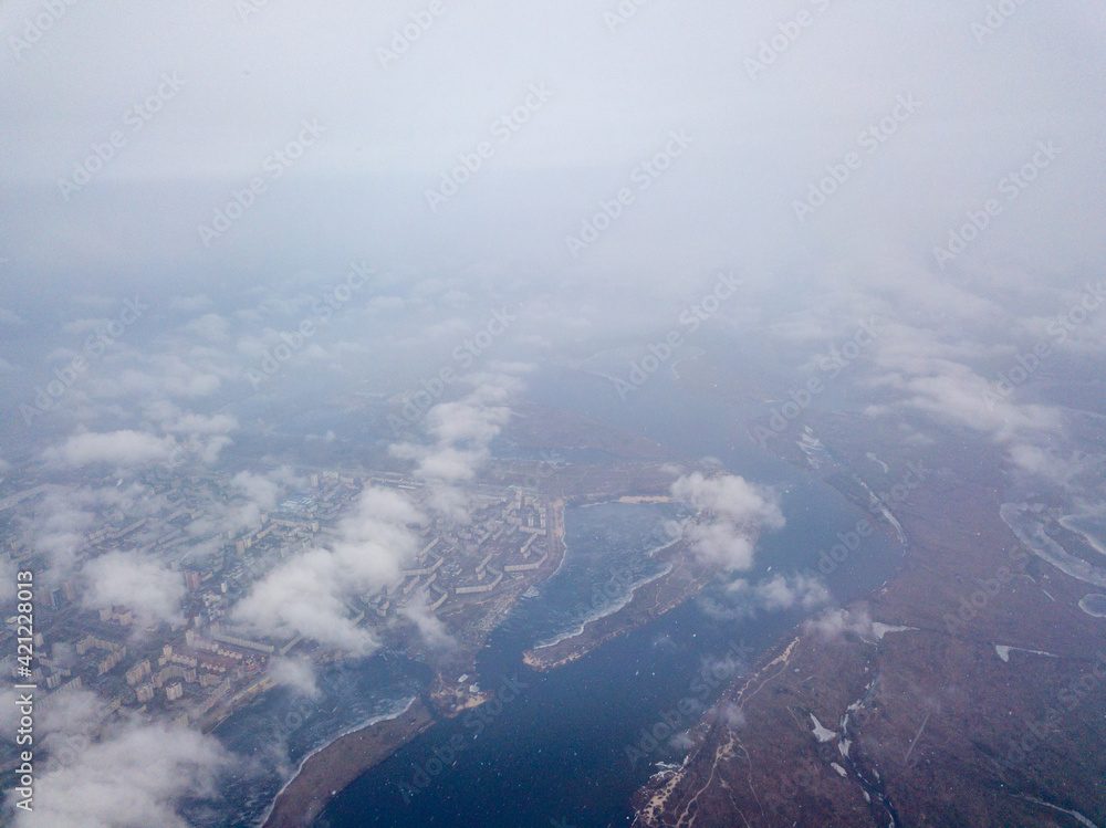 Aerial high view. Flight over the clouds of Kiev.