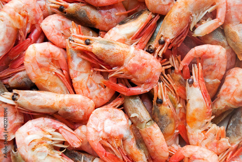Boiled shrimp, background. Full frame, for design and packaging.