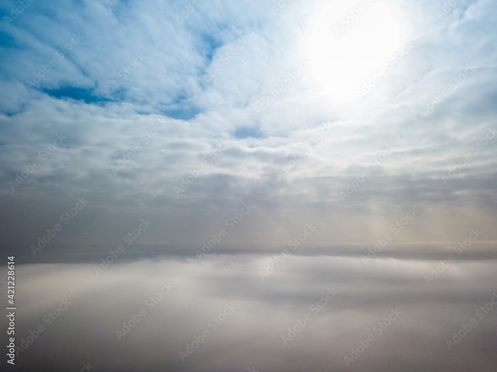 Aerial high view. Flying over the clouds. Aerial high view. Flying over the clouds.