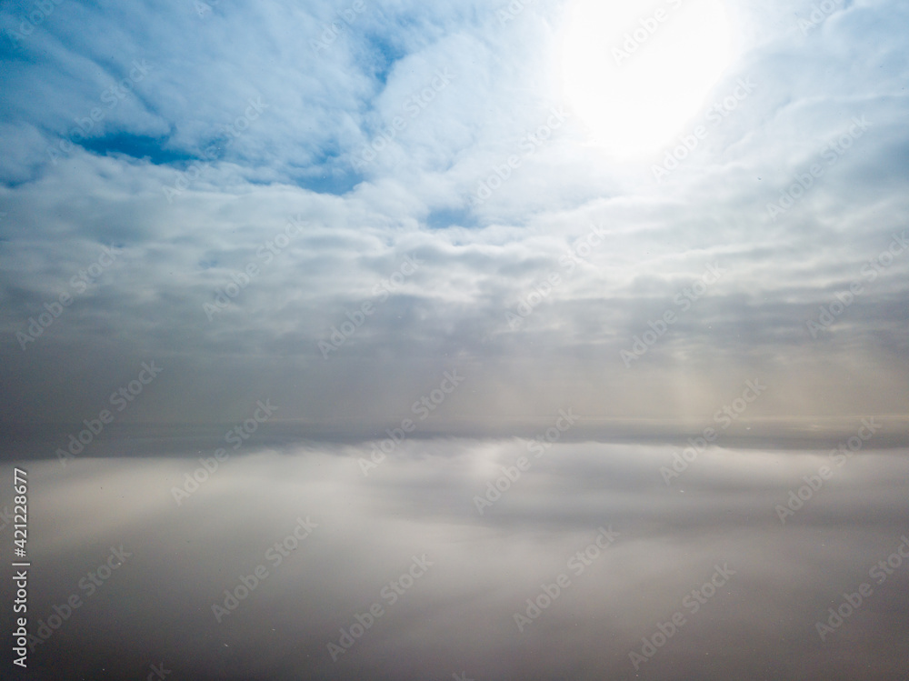 Aerial high view. Flying over the clouds. Aerial high view. Flying over the clouds.
