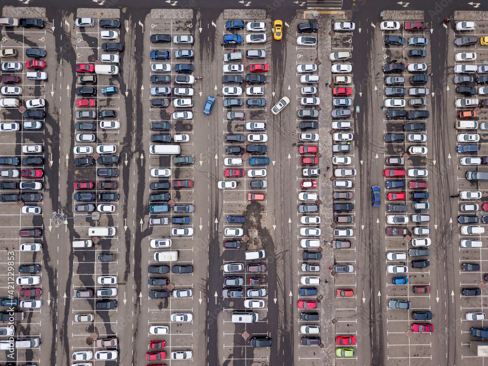 Cars in the parking lot. Aerial drone top view. Cars in the parking lot. Aerial drone top view.