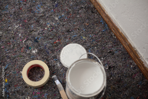 Wallpaper Mural Paint buckets and painting accessories are laid out on painted fleece ready for painting the walls brush and masking tape drip protection paint blobs specialist knowledge preparation renovation tool Torontodigital.ca