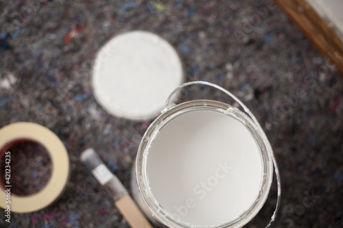 Wallpaper Mural Paint buckets and painting accessories are laid out on painted fleece ready for painting the walls brush and masking tape drip protection paint blobs specialist knowledge preparation renovation tool Torontodigital.ca