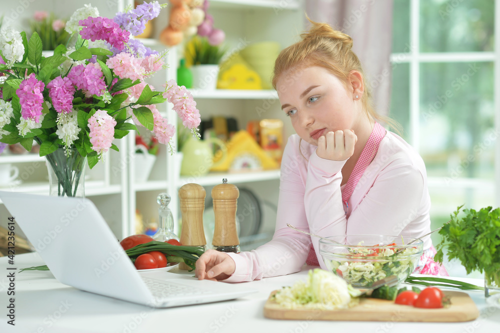 Cute teen girl using laptop Cute teen girl using laptop