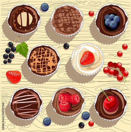 Muffins of different types and berries