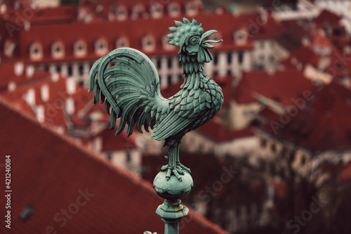 Bronze Weathercock in Praha city