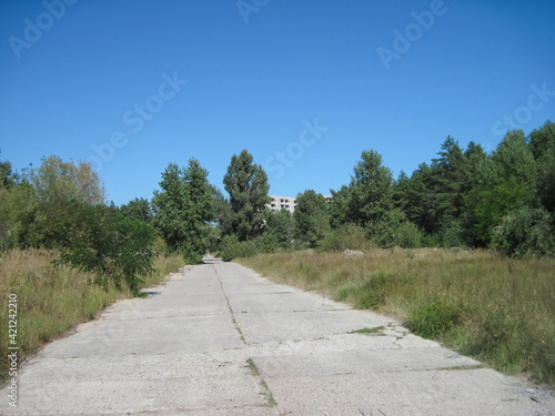 old road is made of concrete slabs. road surface slabs of concre photo