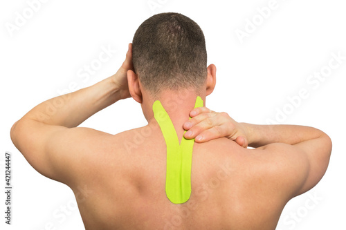 reduction of head and cervical pain with medical tape, isolated on white