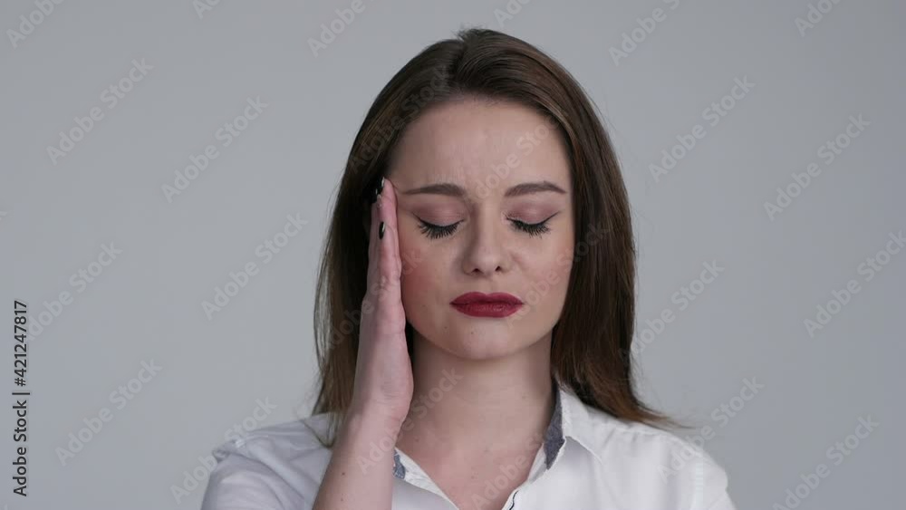 Headache from a lot of work. girl holding her head. Headache from a lot of work. girl holding her head.