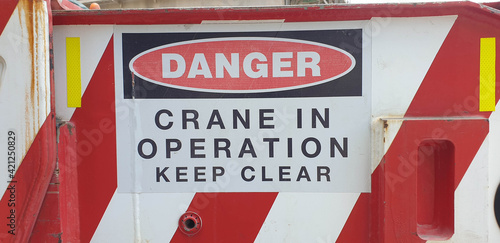 Danger Crane in Operation sign on outrigger