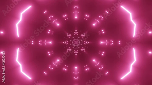 Fast moving vj tunnel animation. Gerometrical symmetrical shapes of neon mangenta and purple. Trippy impression. photo