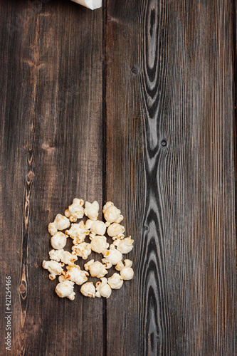 popcorn on a wooden table enjoyment rest meal snack