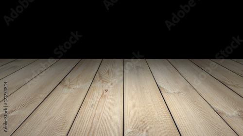 Wooden table perspective with black background