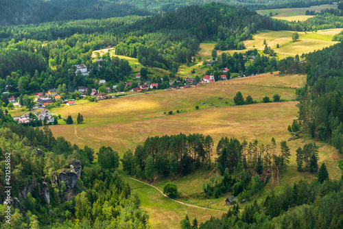 View from mountain to Jetrichovice, Bohemian Switzerland, Czech Republic at sunny summer day © molenira