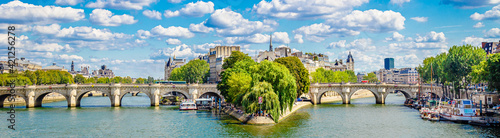 Pont Neuf, the oldest bridge in Paris France and the River Seine on a sunny day © JeanLuc Ichard