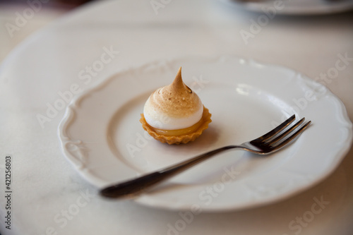 caramel and cream dessert on white porcelain plate 