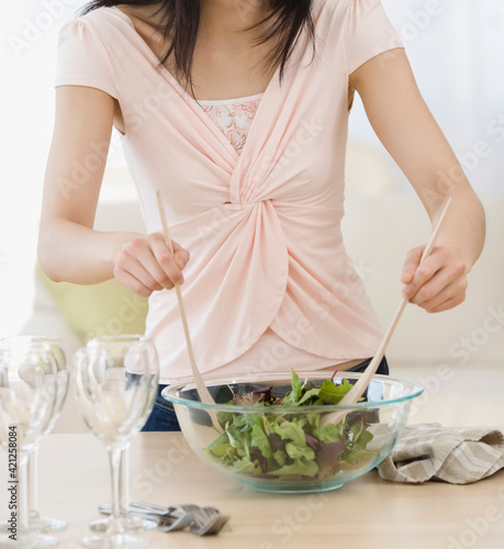 Young Girl, Woman Making Salad. Selective Focus