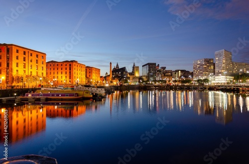 Liverpools Albert Dock in the evening with its buiding reflecting in to the docks still water