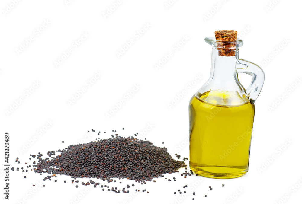 Oil and pile of rape seeds on a white background Oil and pile of rape seeds on a white background