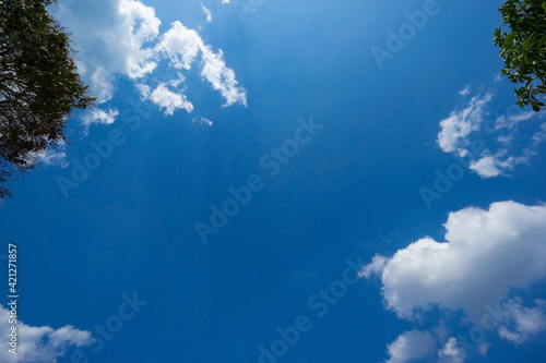 Blue sky background with clouds © Jphoto4956