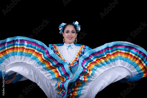 Latin woman dressed in a dress from Jalisco Mexico,