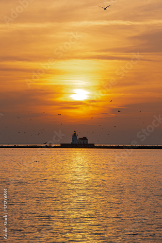 Sunset at a lighthouse on lake erie ohio © Alex