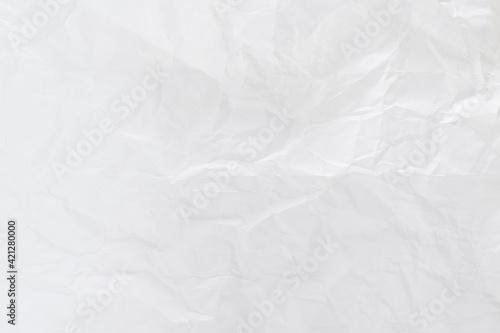 Crumpled white paper sheet texture