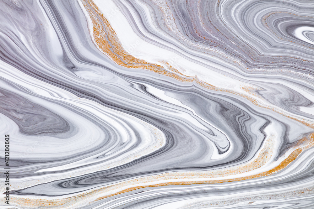 Fluid art texture. Abstract background with iridescent paint effect. Liquid acrylic picture with artistic mixed paints. Can be used for baner or wallpaper. Black, white and golden overflowing colors. Fluid art texture. Abstract background with iridescent paint effect. Liquid acrylic picture with artistic mixed paints. Can be used for baner or wallpaper. Black, white and golden overflowing colors.