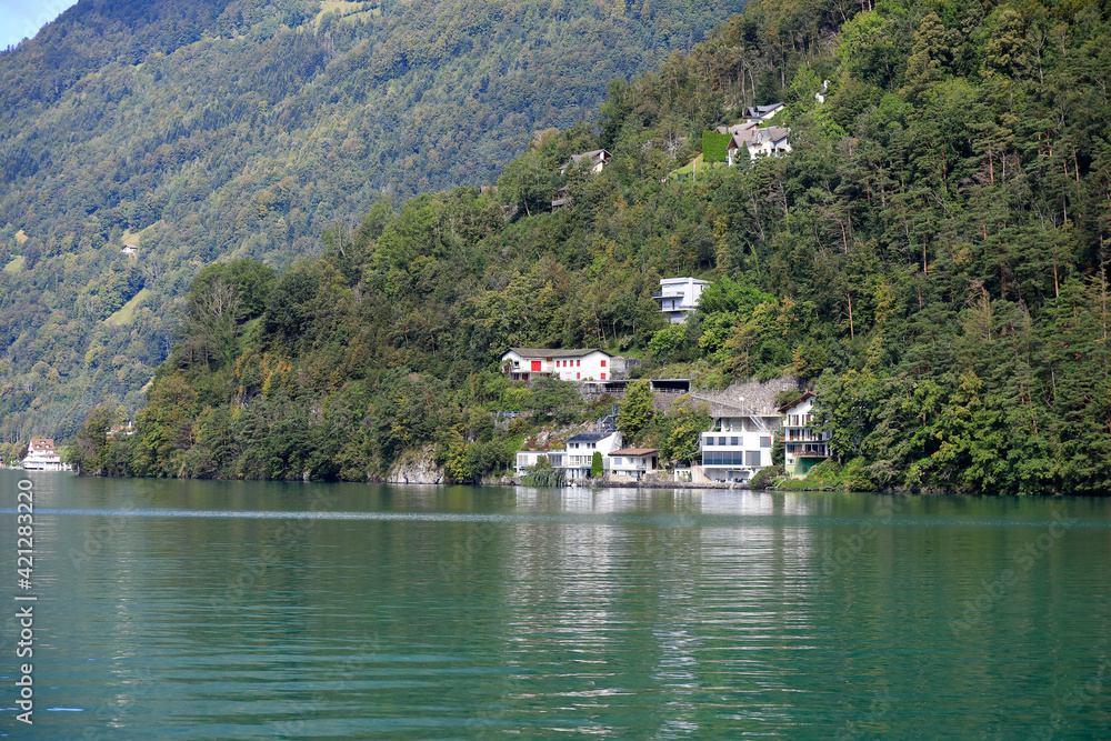 Several houses on the edge of the lake