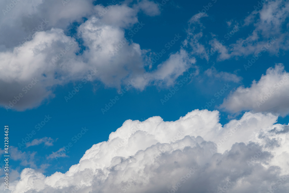 Beautiful blue sky with fluffy white clouds. Sky clouds backgrounds. Beautiful blue sky with fluffy white clouds. Sky clouds backgrounds.