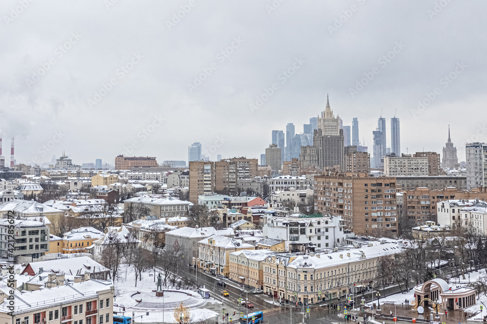 Panorama of Moscow in winter, city view, residential buildings from a bird's eye view. Observation deck.