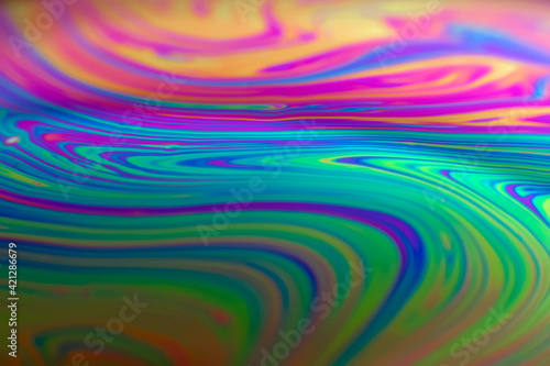 Colorful psychedelic soap bubble refractions pattern macro. Colorful macro Soap bubble iridescence