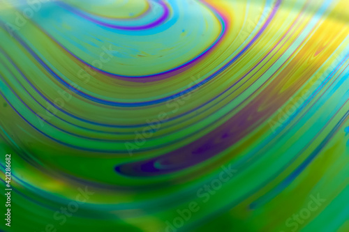 Colorful psychedelic soap bubble refractions pattern macro. Colorful macro Soap bubble iridescence