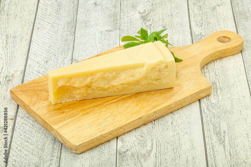 Hard parmesan cheese served basil