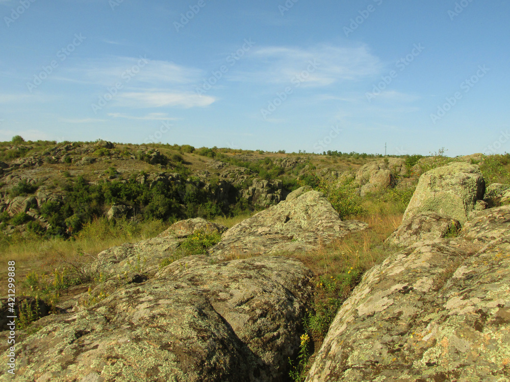 Stone mountains with green vegetation Stone mountains with green vegetation