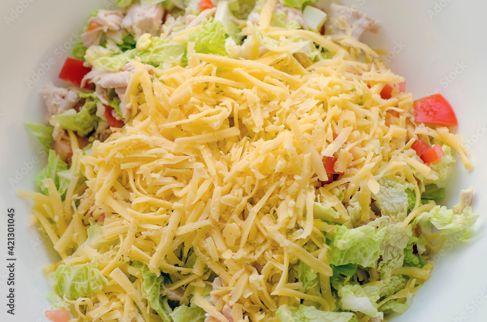 Delicious salad with cheese and green lettuce. Healthy food. Delicious salad with cheese and green lettuce. Healthy food.
