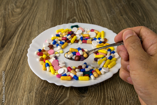 A bunch of pills on a plate