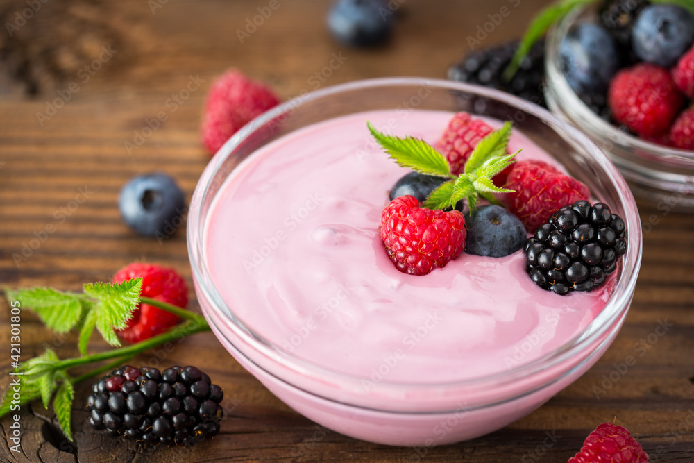 Fresh berry fruit yogurt with forest fruits and mint
Fresh berry fruit yogurt with forest fruits and mint