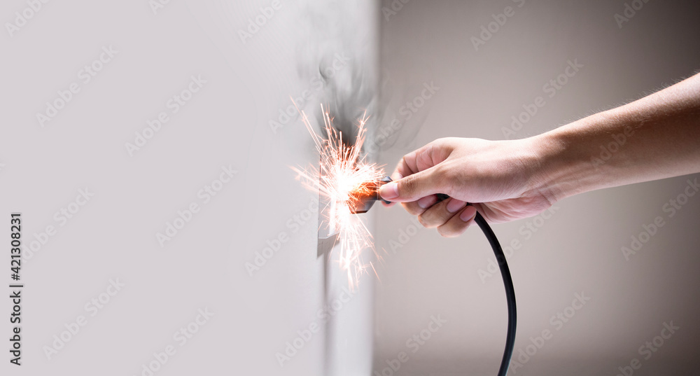 Hand connecting electrical plug cause electric shock, Idea for causes