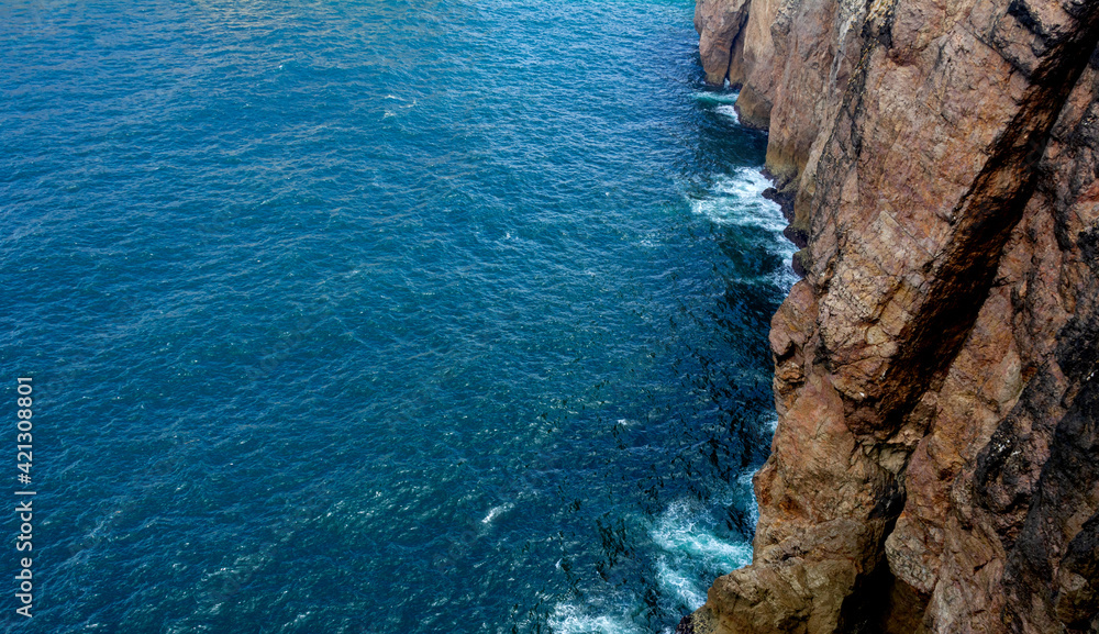Cliffs in the sea off the coast of Sagres, Algarve, Portugal