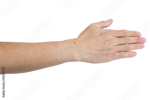 Small white and brown spots on the skin of senior man arm (Idiopathic guttate hypomelanosis).  Isolated on white background. photo