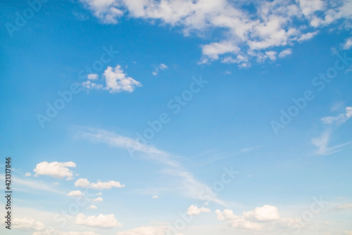 blue clear sky with white clouds on the background © Асель Иржанова