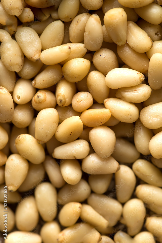 pine nuts in a gray bowl